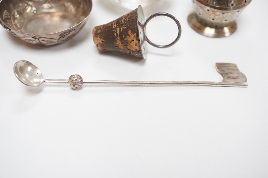 Sundry small silver including a George V mounted glass match strike, golf club condiment spoon and a Scottish silver mounted cork stopper. Condition - fair